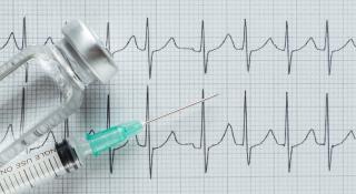 Ajmalinetest met EKG grafiek op achtergrond